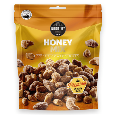 Pakke med Nordthy Honey Mix, sødt belagte nødder, 150g. Varme farver og "Premium Quality" mærkat.